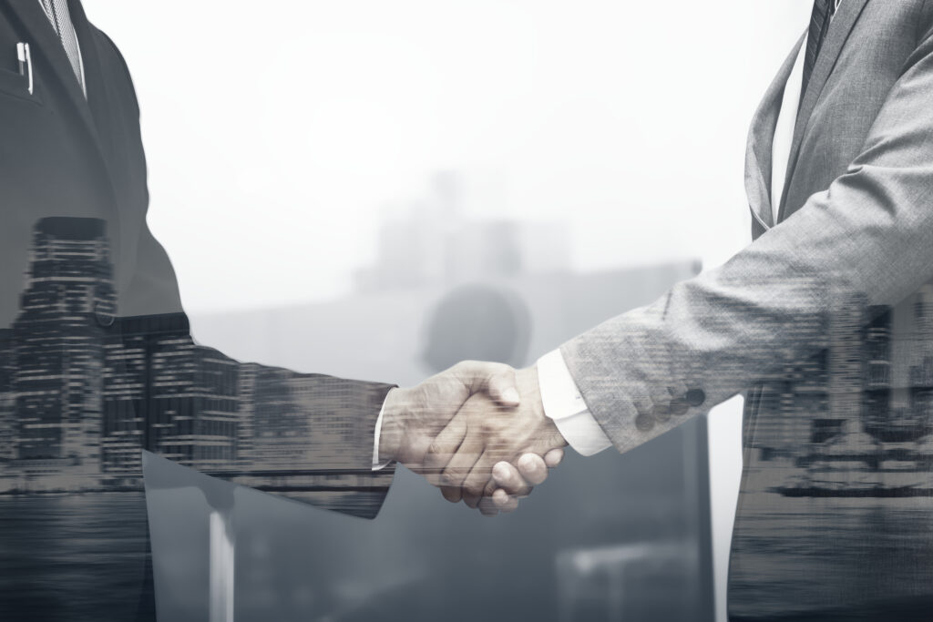 business partners handshake international business concept